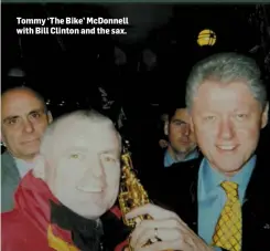  ??  ?? Tommy ‘The Bike’ McDonnell with Bill Clinton and the sax.