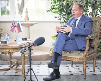  ?? REUTERS ?? Ambassador of Russia to the United Kingdom Andrei Kelin speaks during an interview with Reuters, inside the residence of the Russian Ambassador, in London on Thursday.