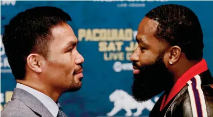  ?? PHOTO BY AP ?? FACE OFF. Manny Pacquiao, left, and Adrien Broner face off at a news conference, Monday, Nov. 19, 2018, in New York. Story on page 15.