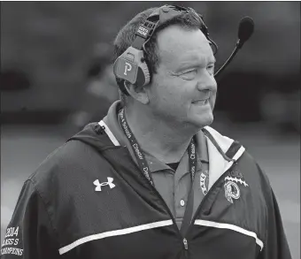  ?? DANA JENSEN/THE DAY ?? Valley Regional/Old Lyme coach Tim King works the sideline before a game against Old Saybrook/ Westbrook on Oct. 6. The Warriors remained unbeaten Friday night with a 27-6 win over North Branford.