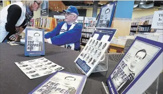  ?? CLIFFORD SKARSTEDT/EXAMINER ?? Shayne Randall chats with visitor Alma Devries as he sign copies of his book Saturday at Chapters.