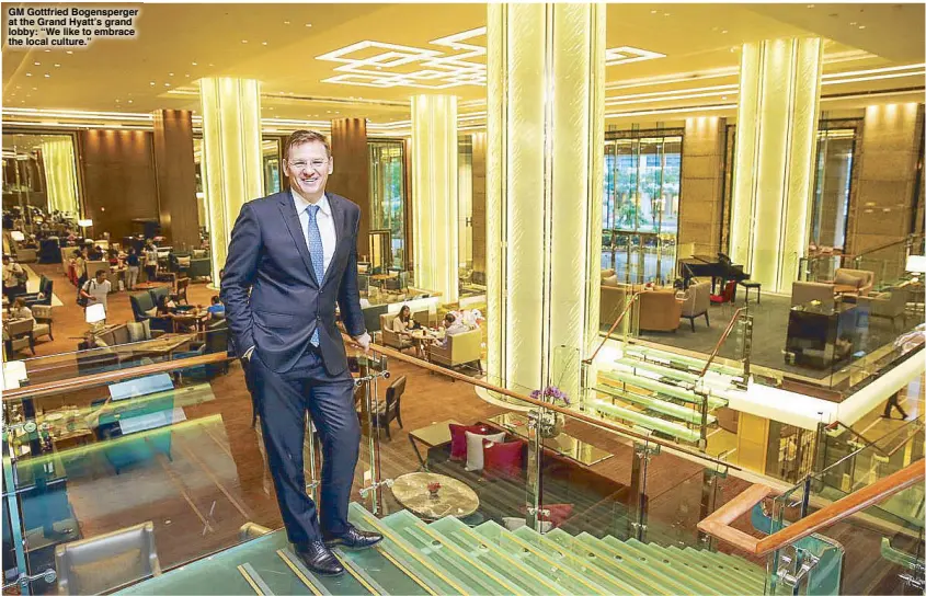  ??  ?? GM Gottfried Bogensperg­er at the Grand Hyatt’s grand lobby: “We like to embrace the local culture.” GEREMY PINTOLO