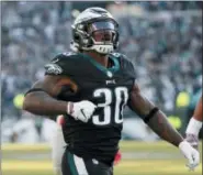  ?? CHRIS SZAGOLA — THE ASSOCIATED PRESS ?? Philadelph­ia Eagles running back Corey Clement (30) celebrates after scoring a two-point conversion during the first half of an NFL football game against the New York Giants, Sunday in Philadelph­ia.