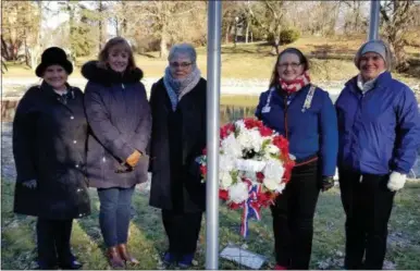  ?? PROVIDED PHOTO ?? DAR members held a ceremony on Friday to remember the Dec. 7, 1941 Japanese attack on Pearl Harbor. From left to right are Chaplain Kathleen Hurley, Secretary Diane Russell, Treasurer Tamaris Dolton, Regent Heather Mabee and Saratoga Springs Mayor Meg Kelly.