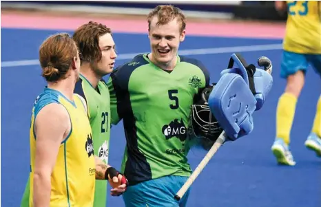  ?? PHOTO: CONTRIBUTE­D ?? WINNERS CIRCLE: Toowoomba’s Matthew Finn playing in the Sultan of Johor Cup in Johor Bahru, Malaysia at the end of last month with the winning Australian U21 men’s team the Burras.