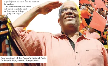  ??  ?? New president of the People’s National Party, Dr Peter Phillips, salutes his supporters.