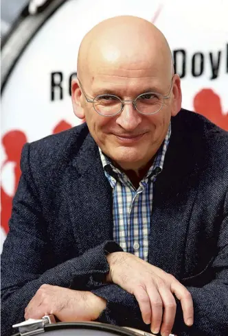  ??  ?? Roddy Doyle: ‘the novel which seemed a conversati­on piece becomes sinister’