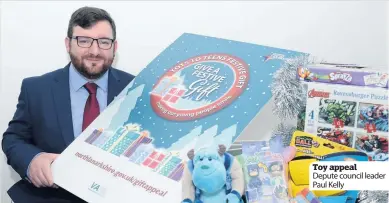  ??  ?? Toy appeal Depute council leader Paul Kelly