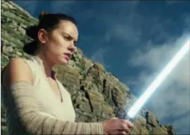  ?? LUCASFILM VIA AP ?? This image released by Lucasfilm shows Daisy Ridley as Rey in “Star Wars: The Last Jedi,” in theaters on Dec. 15.