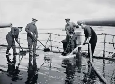  ??  ?? A brush-up for HMS Duke of Edinburgh, shortly after surviving the Battle of Jutland