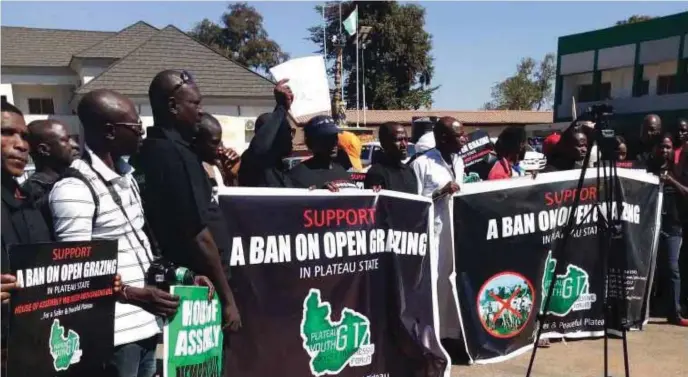  ??  ?? Protesters against open grazing at the Plateau State House of Assembly