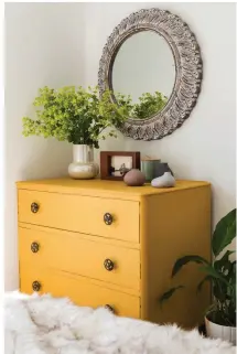  ?? ?? Picked up in a local vintage shop called Odds & Todds, this 1940s chest of drawers has been given a new lease of life with a lick of yellow paint