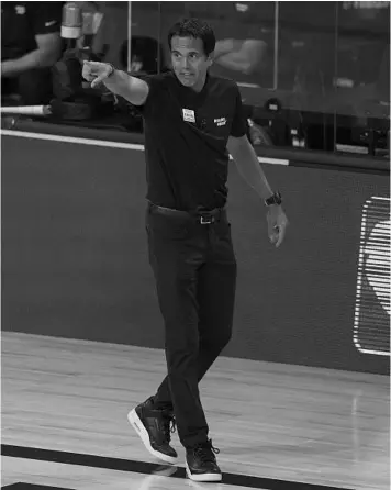  ?? MARK J. TERRILL/AP ?? Heat head coach Erik Spoelstra instructs his team during the first half of Game 4 of the Eastern Conference finals last week against the Celtics.