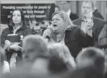  ?? Leah Hennel, Calgary Herald ?? Greenview resident Vicky Farr voices concerns at a meeting Wednesday about plans to create social housing at a former northeast hotel.