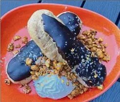  ?? ?? Eclairs have an Asian flair with Chinese five-spice powder and a togarashi-accented peanut crumble at Rhea.