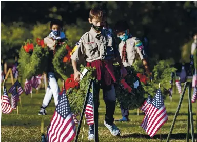 Wreaths At Cemetery A Tribute To Veterans Pressreader