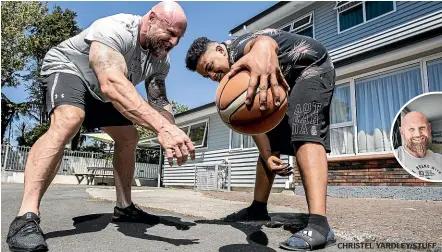  ??  ?? CHRISTEL YARDLEY/STUFF
Darren Farrow with one of their former foster boys Adam Braden-Brown. Inset: Darren and Dorah Farrow have been foster carers for Oranga Tamariki for the past five years and have had about 170 boys through their care.