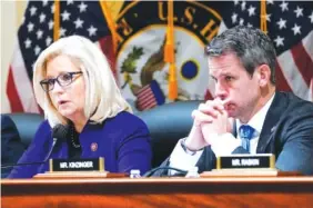  ?? AP PHOTO/J. SCOTT APPLEWHITE ?? Rep. Liz Cheney, R-Wyo., and Rep. Adam Kinzinger, R-Ill., listen during the House select committee meeting investigat­ing the Jan. 6 attack on the U.S. Capitol on Tuesday in Washington.