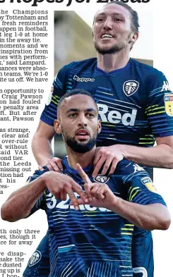  ?? REX FEATURES ?? Advantage: Leeds’ Roofe (front) and Ayling celebrate