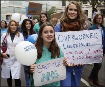  ??  ?? A demonstrat­ion in London in support of junior doctors, who are due to strike tomorrow