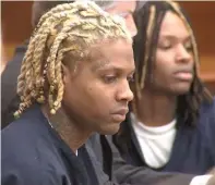  ?? FULTON COUNTY, GEORGIA, SUPERIOR COURT ?? Lil Durk ( left) and King Von at a court hearing after they were charged with attempted murder in connection with a 2019 shooting in Atlanta.