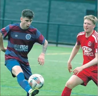  ?? ?? Ciaran MacPhee of Red Star and Rory Dowd of Oban Saints during a pre-season friendly match in Oban on July 9.