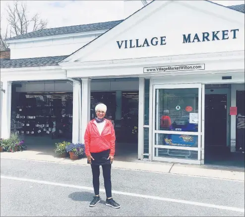  ?? Contribute­d photos ?? Georgann Frey celebrates her 10-mile walk from Ridgefield to Wilton Center on May 12.