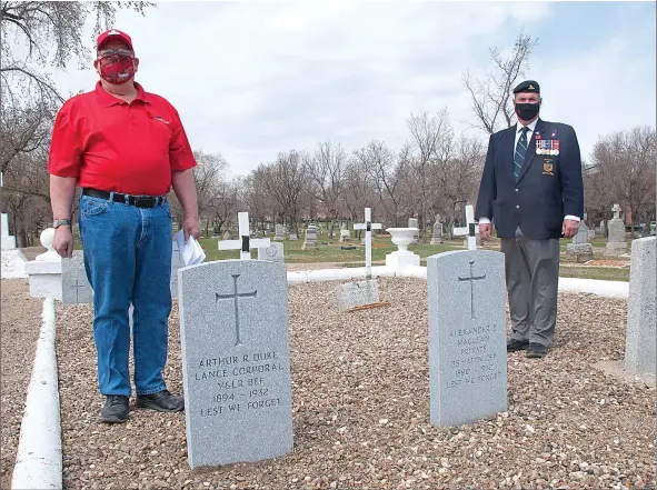  ?? SCOTT ANDERSON/SOUTHWEST BOOSTER ?? Former Royal Canadian Legion Branch #56 President Jim Pratt was joined by Last Post Fund volunteer Glenn Miller in highlighti­ng the upgrade from white wooden crosses to military headstones which has occurred at the Swift Current Field of Honour at the Mount Pleasant Cemetery.