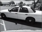  ?? LOANED PHOTO ?? THIS 2006 FORD CROWN VICTORIA Police Intercepto­r has been donated by the Yuma Police Department to Kofa High School for use in the Career and Technical Education criminal justice program.