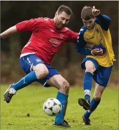  ??  ?? Conary’s Andy Kennedy and Town’s Paddy Murphy battle it out.