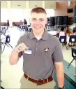  ?? MARK HUMPHREY ENTERPRISE-LEADER ?? Zeke Laird, a 2017 Prairie Grove graduate and Army officer in training at West Point, displays a National Championsh­ip ring won while playing offensive lineman as part of the Army’s Sprint Football team.