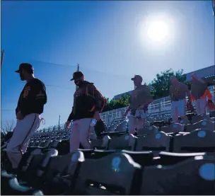  ?? SUZANNA MITCHELL — GIANTS ?? Giants players participat­e in spring training at Scottsdale Stadium in Scottsdale, Ariz., on Feb. 21.