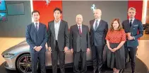  ?? ?? From left are Velocità Motors, Inc. (VMI) Director Jacob Ang; Rocco Zamora, representa­tive of San Juan Mayor Francis Zamora; VMI President and Chairman Ramon S. Ang; Ferrari S.p.A. Head of Global Sales Luca Zanetti; Ferrari Far East Head of Communicat­ions Hui Ping Lim; and Ferrari Far East Head of Sales Charles Geneste.