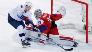  ?? Reuters ?? Ryan Donato of the US misses in a shootout on goalie Pavel Francouz of the Czech Republic. —