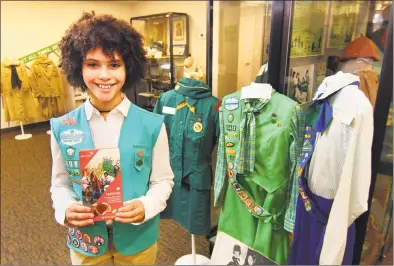  ?? Christian Abraham / Hearst Connecticu­t Media ?? Girl Scout Samira Tanko, of Stratford, at the Girl Scouts North Haven Office on Wednesday. Tanko is going to be pictured on Girl Scout Cookies boxes nationwide.