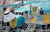  ?? TED S. WARREN/AP ?? A Boeing 737 Max 8 airplane is seen under constructi­on at Boeing’s assembly facility in Renton, Wash.