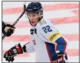  ?? AP/IVAN SEKRETAREV ?? Korea’s Michael Testwuide is among seven North American-born players playing on the Korean hockey team.