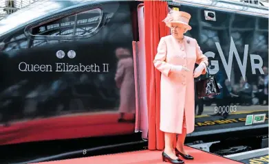  ?? JACK BOSKETT. ?? On June 13, Her Majesty The Queen stands next to 800003, which she had just named Queen Elizabeth II, having travelled on the Intercity Express Programme set from Slough.