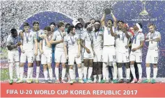 ?? AP ?? England players celebrate after defeating Venezuela 1-0 to win the final of the FIFA U-20 World Cup Korea 2017 at Suwon World Cup Stadium in Suwon, South Korea, yesterday.