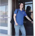  ?? Photo by Neil Abeles ?? ■ Dr. Bethany Rife arrives at the door of her office on West Houston Street in Linden.