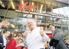  ?? MIKE STOCKER/SOUTH FLORIDA SUN SENTINEL ?? Virgin Group Chairman Richard Branson celebrates the renaming of Brightline’s rail station in downtown Miami to Virgin MiamiCentr­al in 2019.