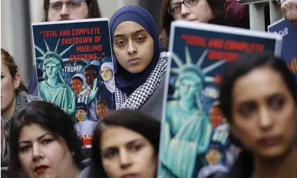  ?? ?? A protest against Donald Trump’s travel ban in Richmond, Virginia, 28 January 2020. Photograph: Steve Helber/AP