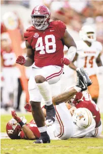  ?? VASHA HUNT/AP ?? Alabama defensive lineman Phidarian Mathis does a dance after a sack against Mercer last season. The Washington Commanders selected Mathis in the second round with the 47th overall pick.