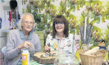  ?? Picture: Mandy Jones Photograph­y ?? Fairways Newydd Ltd Nursing and Dementia Care Centre resident Pam Williams with Pamela Cuffin, activities co-ordinator who has been nominated for a Wales Care Award in the Excellence in Dementia Care category