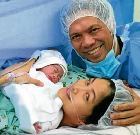  ??  ?? Miriam Quiambao with husband Ardy (right) and son Elijah