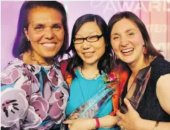  ??  ?? Zulie Sachedina, Bonnie Foley-Wong and Vanessa Timmer celebrate their Women of Distinctio­n honours after the awards ceremony.