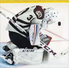  ?? CLIFFORD SKARSTEDT EXAMINER ?? Peterborou­gh Petes goalie Tye Austin stops a shot against the Kingston Frontenacs during OHL exhibition action last Thursday at the Memorial Centre. The teams will face off again in the season opener Thursday.