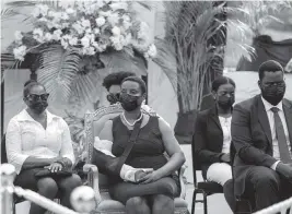  ?? JOSEPH ODELYN AP ?? Martine Moïse, center, sits during a tribute for her late husband, President Jovenel Moïse, at the Museum of the National Pantheon in Port-au-Prince on Wednesday.