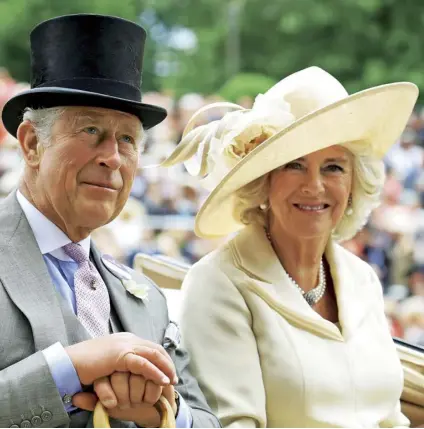  ??  ?? With Camilla, Duchess of Cornwall, arriving at Ascot, June 2018