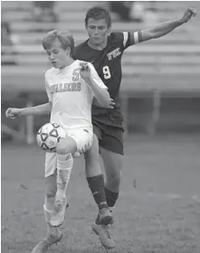  ?? DYLAN SLAGLE/BALTIMORE SUN MEDIA GROUP ?? South Carroll’s Trent Brauer and Francis Scott Key’s Jakub Mihulka try to win the ball during the Cavaliers’ 6-2 victory.